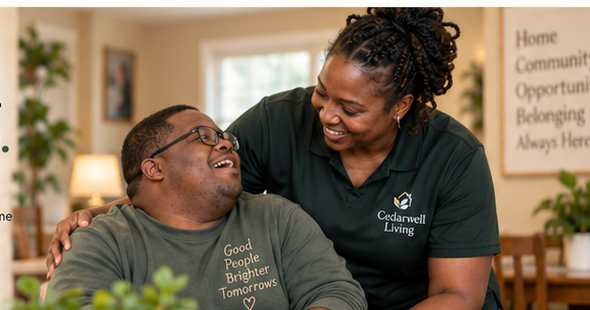 Illustrative photo of a smiling man and an attentive woman sharing a warm moment at home